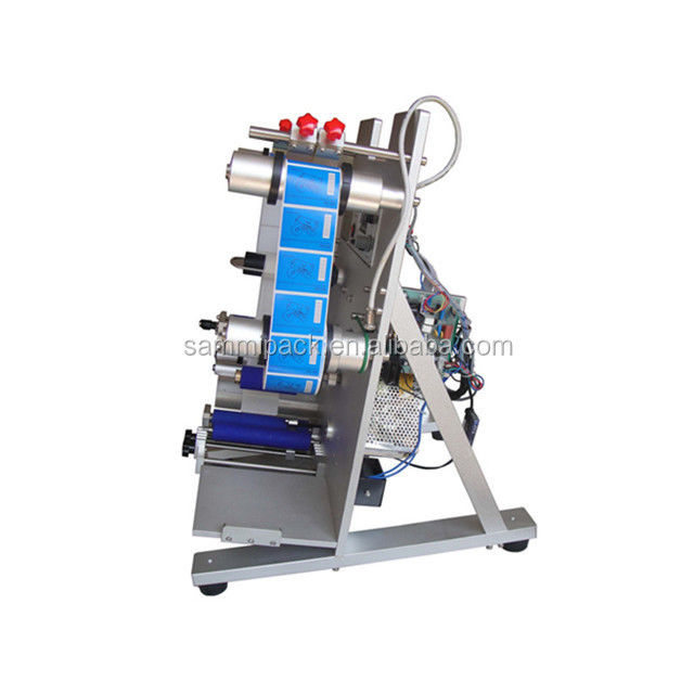 ইলেকট্রিক ইয়ার ড্রপ গোলাকার বোতল লেবেলিং মেশিন অনন্য নতুন সেমি-অটোমেটিক কোর মোটর উপাদান সঙ্গে